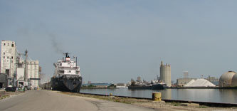 The Algoway is loading corn at the Nidera Grain Elevator while the Algowood arrives to unload salt 8/4/09