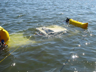 Milwaukee Police divers submerged a vehicle and refloated during an excercise off the Liquid Cargo Pier August 15, 2008