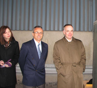 Sandy Siegel Co-Owner of M.E. Dey & Co., Gilles Plante, General Manager of Federal Marine Terminals-Milw and Tim Hoelter, President, Board of Harbor Commissioners, wait for the Press Conference to begin outside of Terminal 2, in below freezing temperatures.