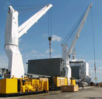 Equipped with her own heavy-lift cranes, the Rosaire A. Desgagnes prepares to load P&H Mining Equipment