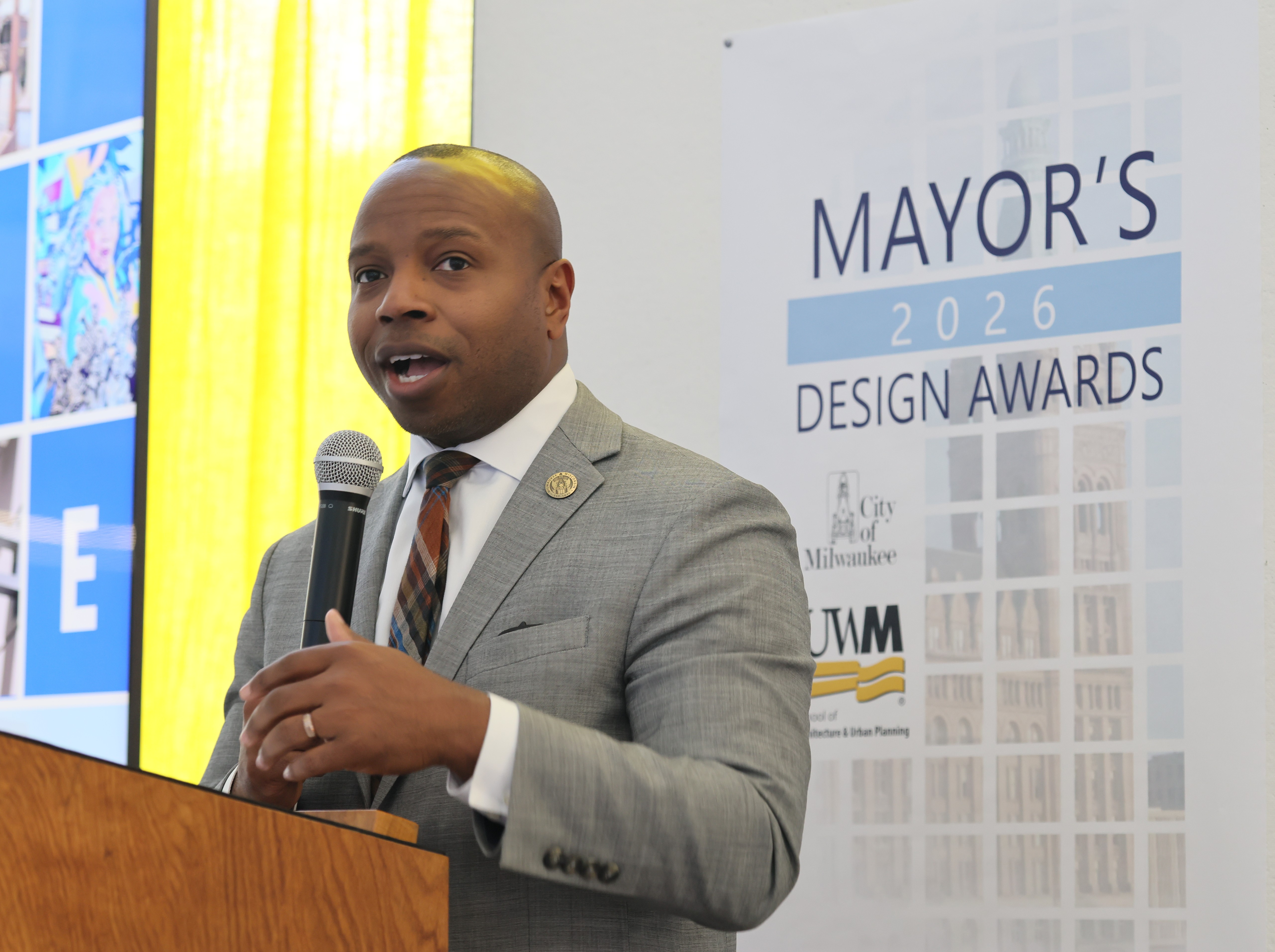 Mayor speaking at podium