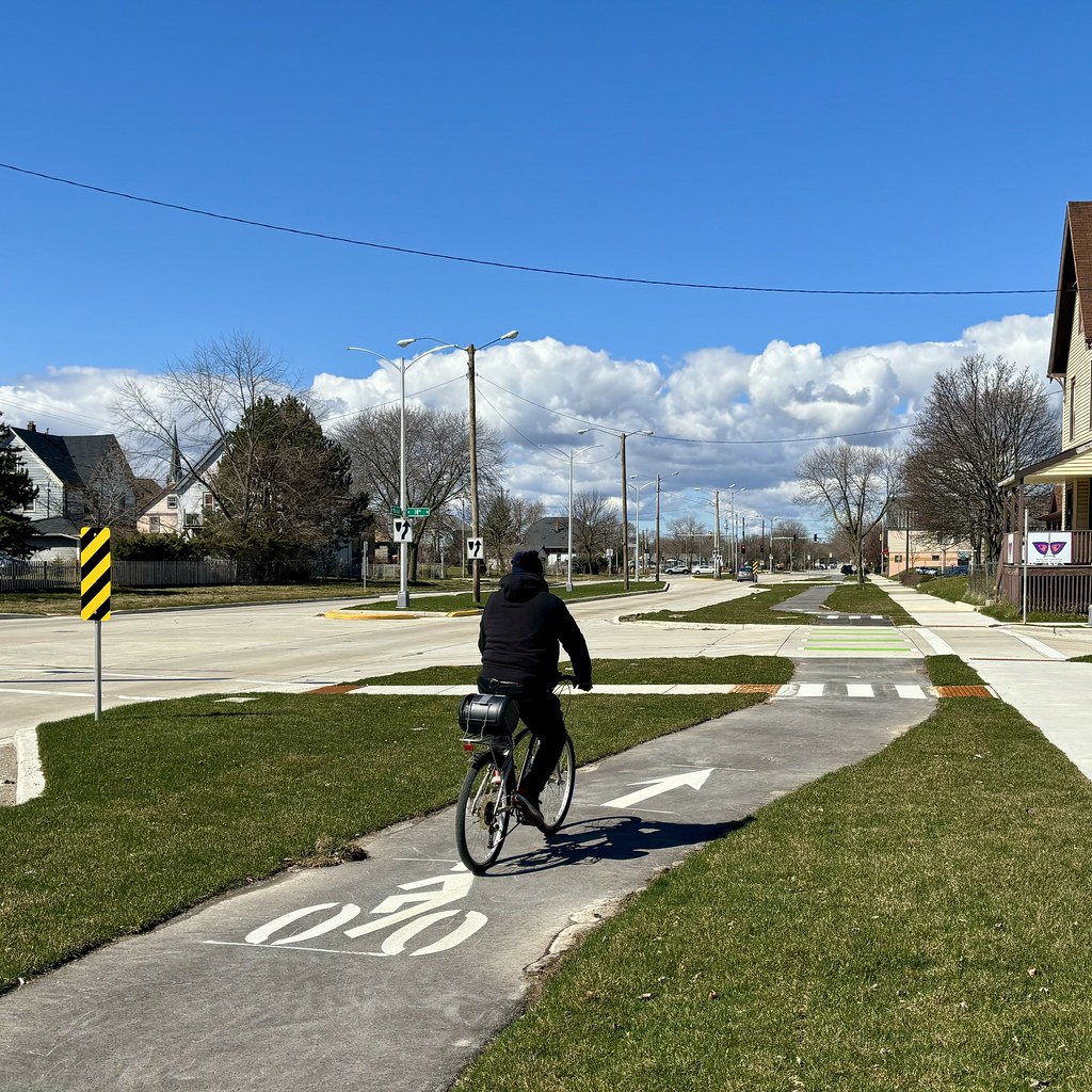 Person riding on an off-street protected bike lane