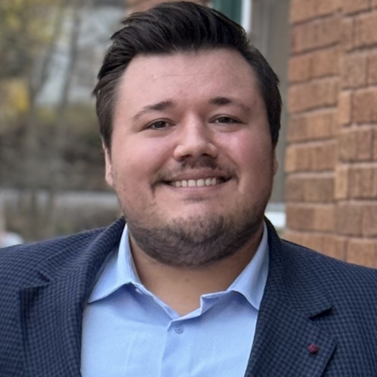 Business Finance Officer Zachary Allen