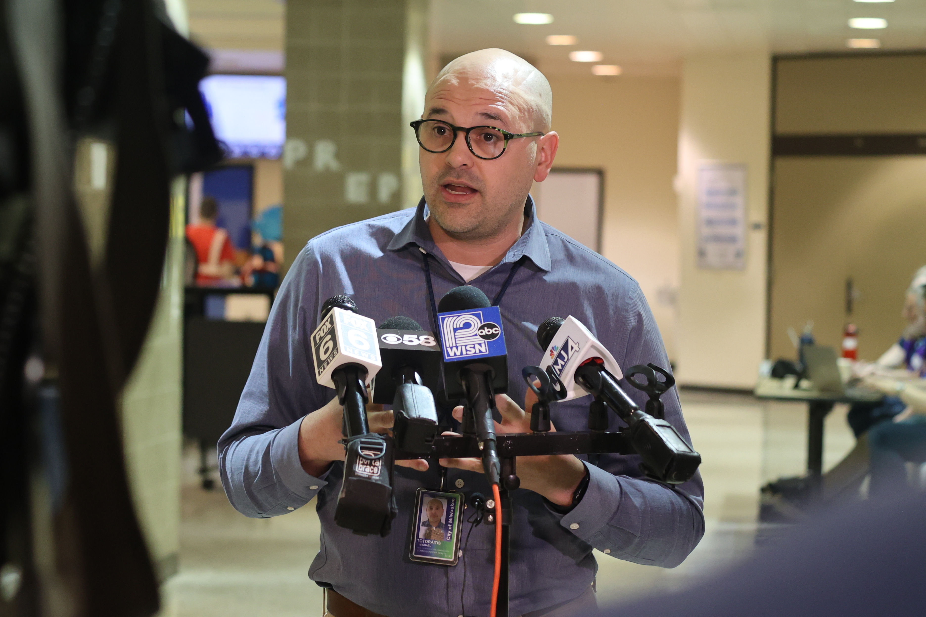 Commissioner of health Dr. Mike Totoraitis providing updates to news media