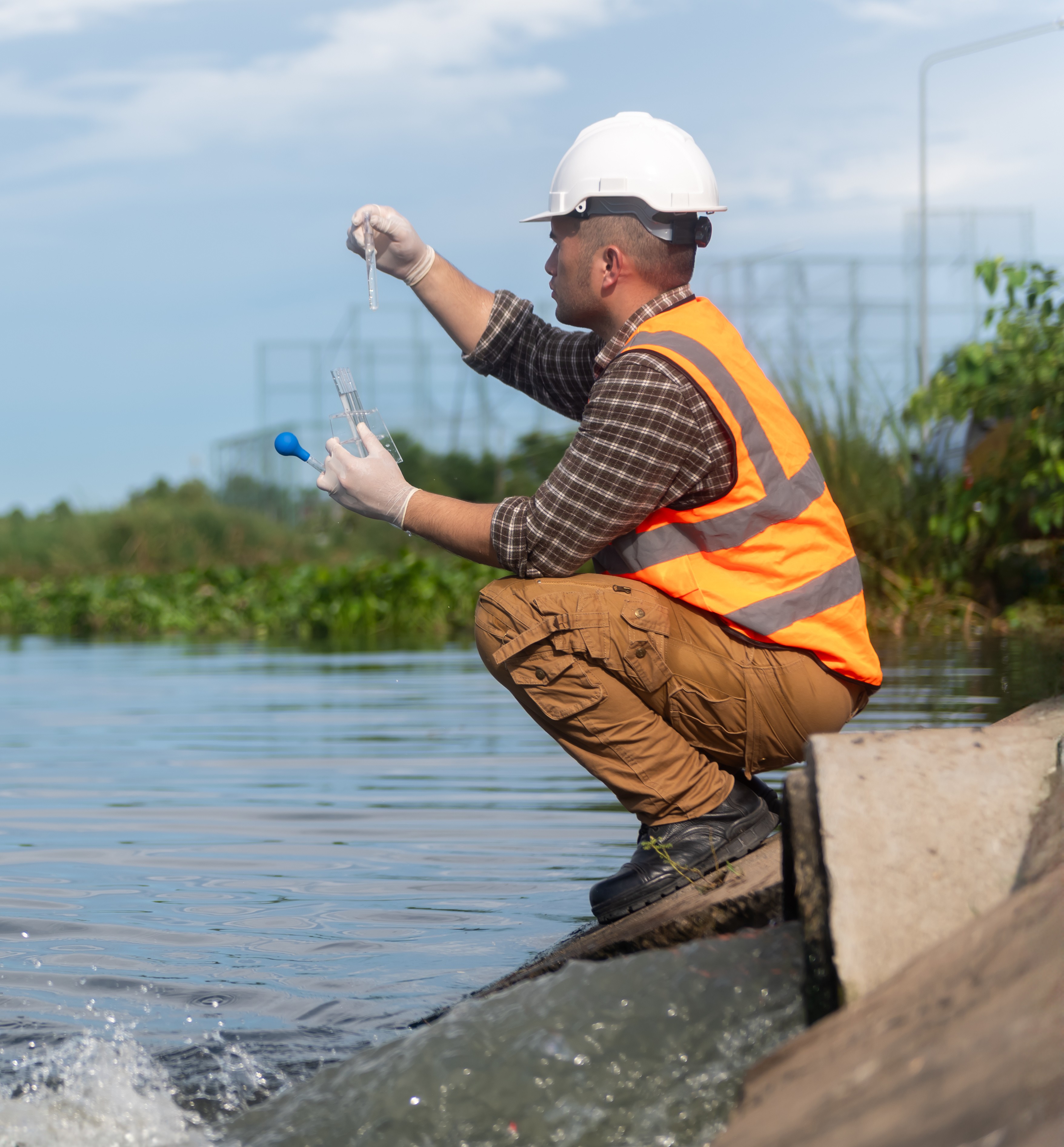 Laboratory professional test wastewater at treatment center