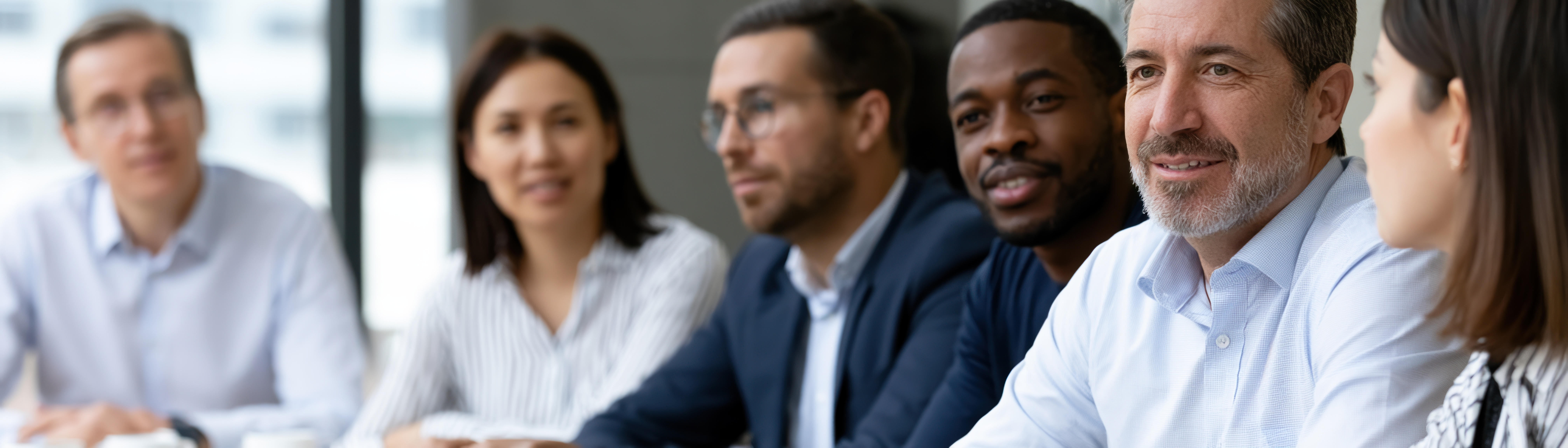 Leadership team discussing goals at a meeting