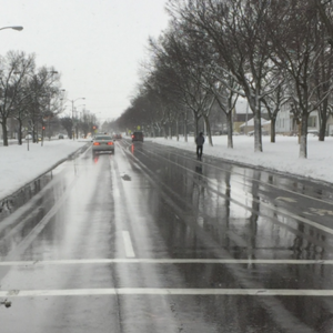 Image of a main street after snow and ice operation.